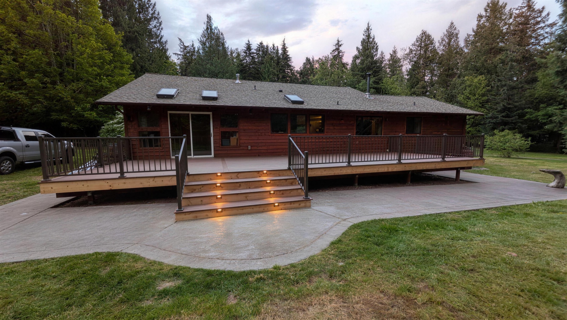 Sarber Construction deck and covered patio build, dusk exterior